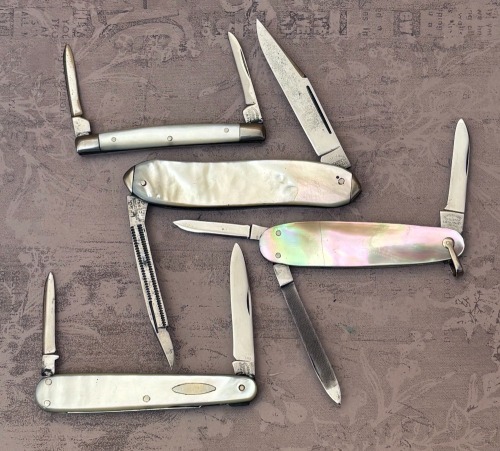 Four Cattaraugus Pearl Folders