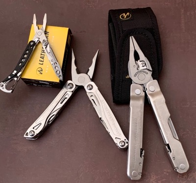 Three Leatherman Multitools