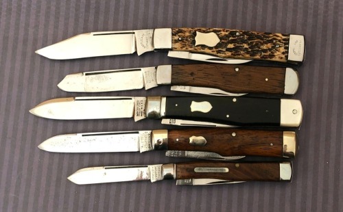 Five Gunstocks: Battle Axe, Germania, Winchester, Majestic Cutlery, and Southington