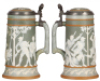 Two Mettlach steins, 1.0L, 2530, cameo, inlaid lid, color changing on body & handle repairs; with, .5L, 1946, etched, inlaid lid, several body hairlines. - 2