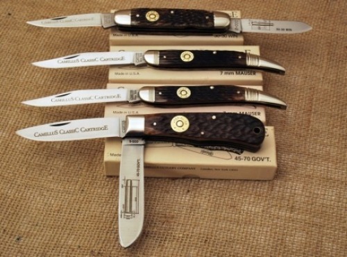 Four bone handled Camillus Cartridge Series