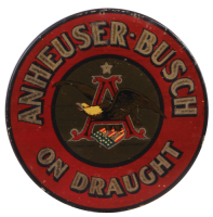 Anheuser-Busch lithograph on metal, 9.9" d., On Draught, trademark reg. U.S. Pat. Off., nail hole and dent on top edge, small paint blemishes.