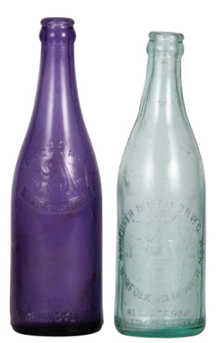 Two Anheuser-Busch bottles, 9.3", marked S. B. & G. Co., purple color, Anheuser-Busch Brew Ass'n. with A & Eagle logo, Washington D.C., Registered 95 around base edge; with, Anheuser-Busch Brewing Ass'n., 9.0" ht., marked A. B. Co. 1083 7, Norfolk, VA Bra