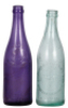 Two Anheuser-Busch bottles, 9.3", marked S. B. & G. Co., purple color, Anheuser-Busch Brew Ass'n. with A & Eagle logo, Washington D.C., Registered 95 around base edge; with, Anheuser-Busch Brewing Ass'n., 9.0" ht., marked A. B. Co. 1083 7, Norfolk, VA Bra