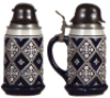 Third Reich stein, 1.0L, stoneware, marked 2694, relief, blue glaze, pewter lid with large cast metal helmet finial with eagle and swastika, very good condition. - 2