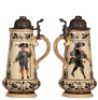 Two steins, pottery, 2.5L, 16.5" ht., 1174, threading, lid damaged, handle tip missing; with, 2.5L, 14.5" ht., by Hanke, 1009, threading, lid dented with tear, handle breaks glued. - 3
