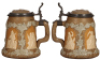 Three Mettlach steins, 1.0L, 812, relief, inlaid lid, mint; .5L, 1467, relief, inlaid lid, mint; .5L, 1370, inliad lid, mint. - 3