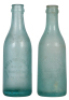Two American Brewing Co. bottles, 7.5" ht., both embossed, American Brewing Ass'n., Houston, Texas, both have frosted finish, very good condition.