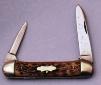 Vintage Tom Ray Bone Canoe