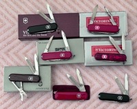 Seven Swiss Army Knives