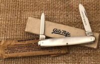 Vintage etched Montgomery Ward Pearl Pen in paper