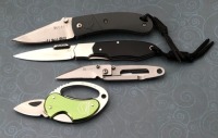 Two CRKT, One Solo, P.E.C.K. and Buck Whittaker