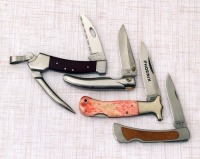Four Folders: A. G. Russell Marlin Spike, Frontier, 2 more