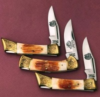 Three Orange Bone Parker Lockbacks