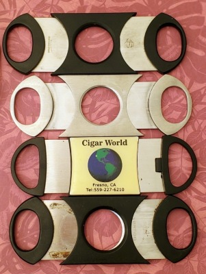 Four Cigar Cutters