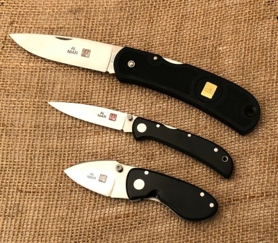 Trio of Al Mar Folders