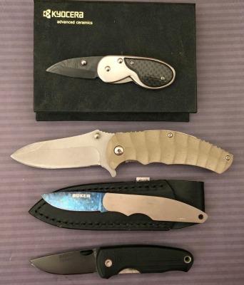 Two Boker one Kyocera and one Unmarked