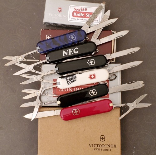 Six Victorinox Swiss Army Knives