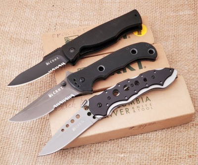 Three CRKT: Prowler, Cruiser SF, and Yea-Go.
