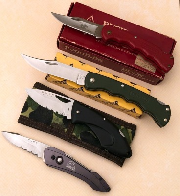 Four Buck Lockbacks Including BSA
