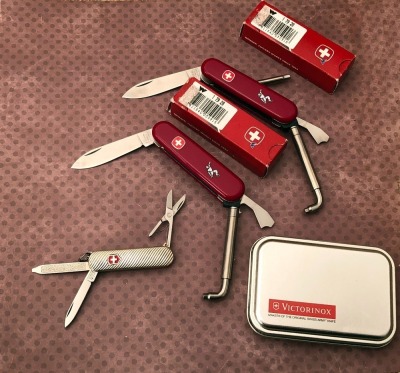 Three Swiss Army Knives, Two Wenger and One Victorinox