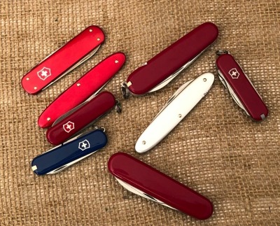 Eight Victorinox Swiss Army Knives