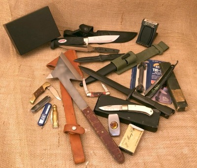 Nine Knives, Two Money Clips, a Sharpener, and a Razor
