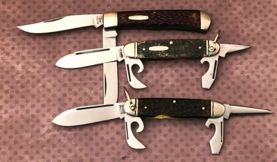 Three Western Folders, Two Scouts and a Trapper