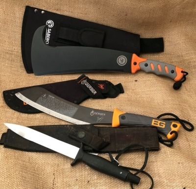 Three Fixed Blades Two Gerber and an UST