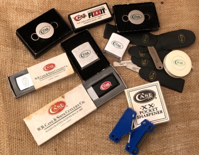 Case Keychains, Knife Picks, Magnifying Glass, Sharpener and a Tape Measure
