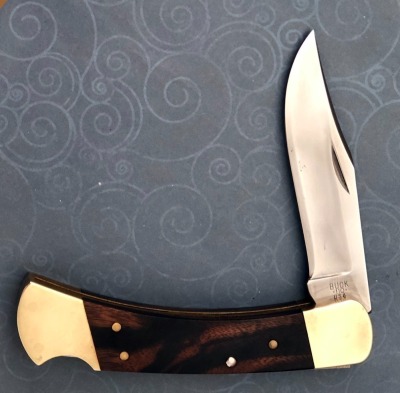 Buck 110 Aurum Etched with Buck and Does '74-'80