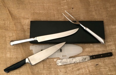 Six Kitchen Knives and a Bowie