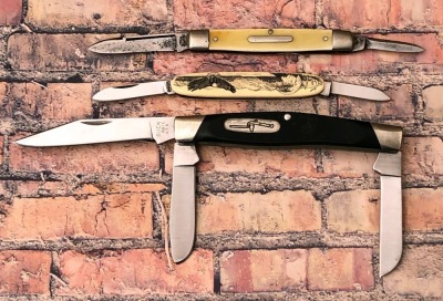 Three Folders: Buck, Barlow USA, and Utica