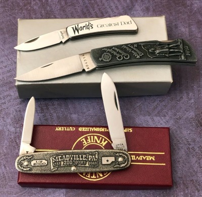 Three Metal Folders