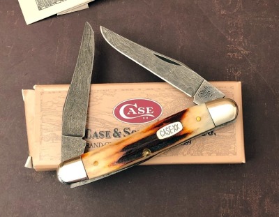 Case Red Stag Damascus Muskrat