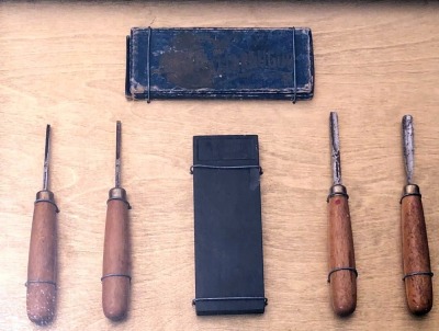 Four Cattaraugus Wood Carving Tools with a Cattaraugus Hone and Box