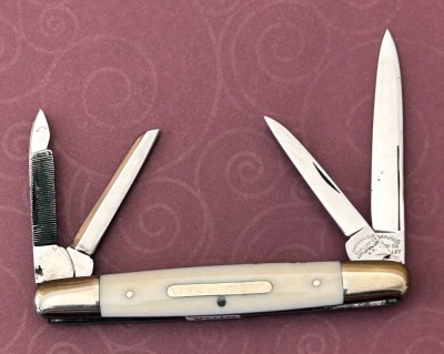 Cattaraugus Exhibition White Bone Four Blade Equal End