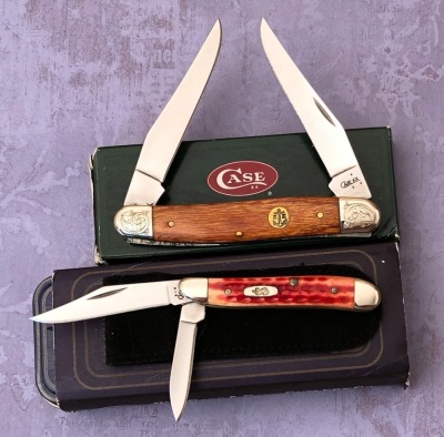 Pair of Case; Teak Muskrat and Bone Peanut