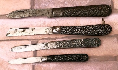 Four Metal Handle Folders