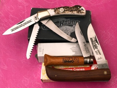 Three Folders,; Kissing Crane, Opinel, and Fox and Hound