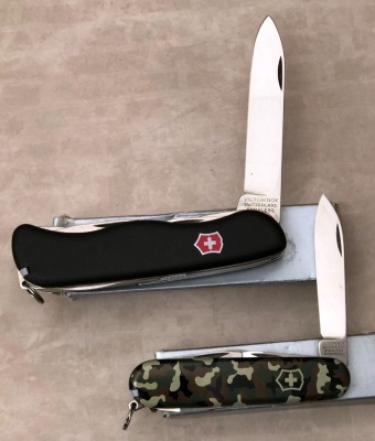 Pair of Victorinox Swiss Army Knives